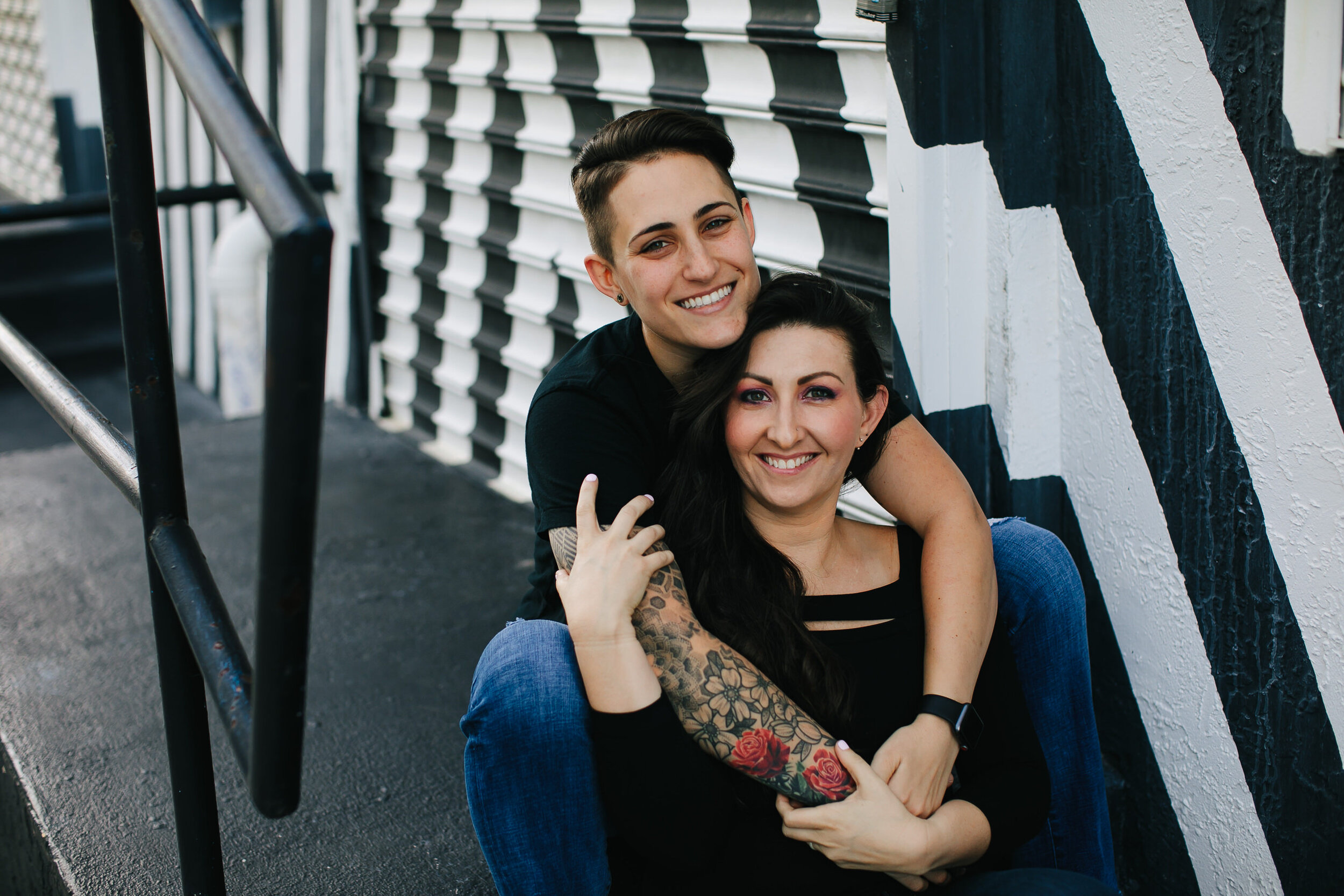 Smiling-happy-lesbians-engagement-session-wynwood-miami-florida-photographer