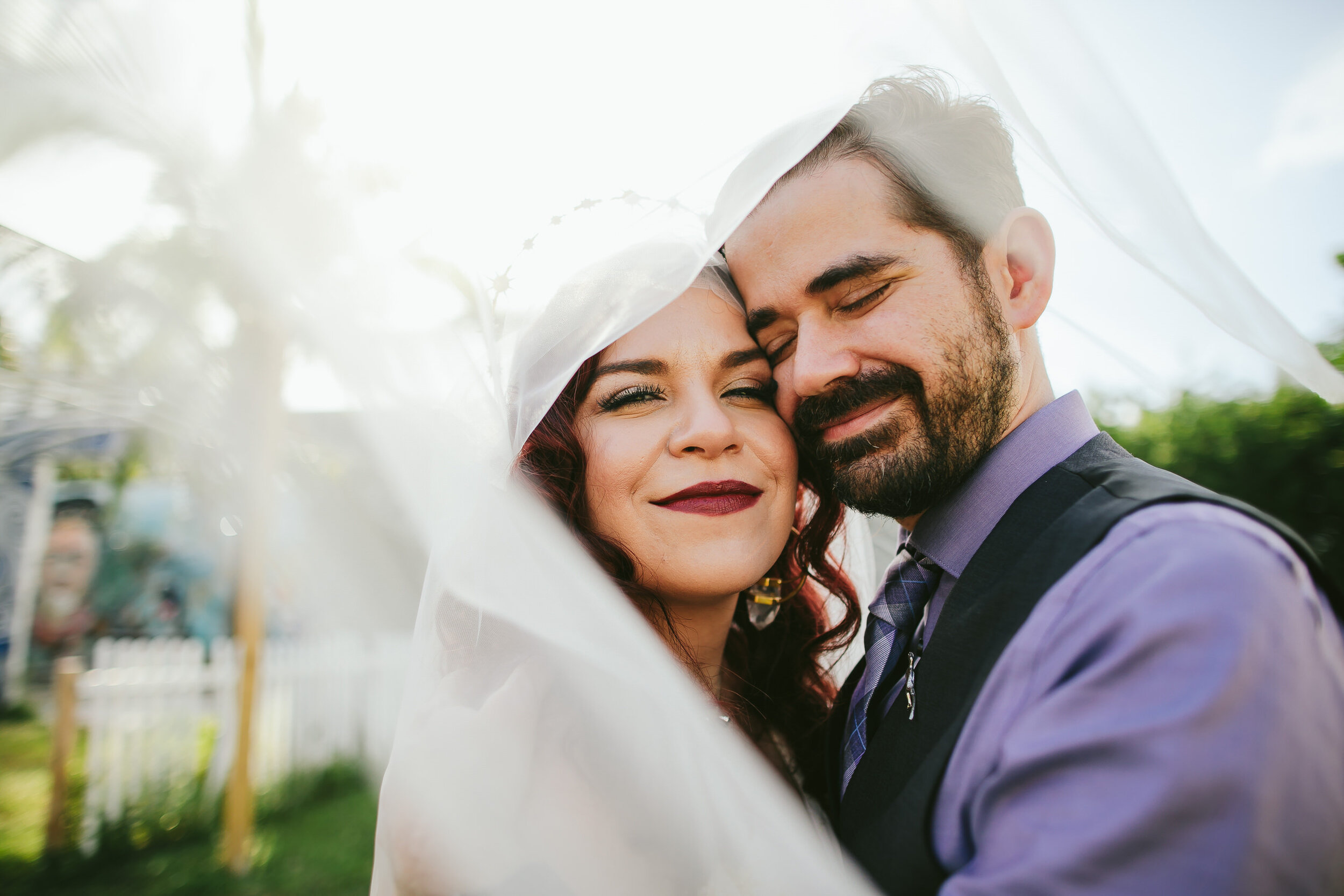 Bride-Groom-Cuddling-Under-Veil-Cutesy-Non-Traditional-Wedding-Photography-Wilton-Manors