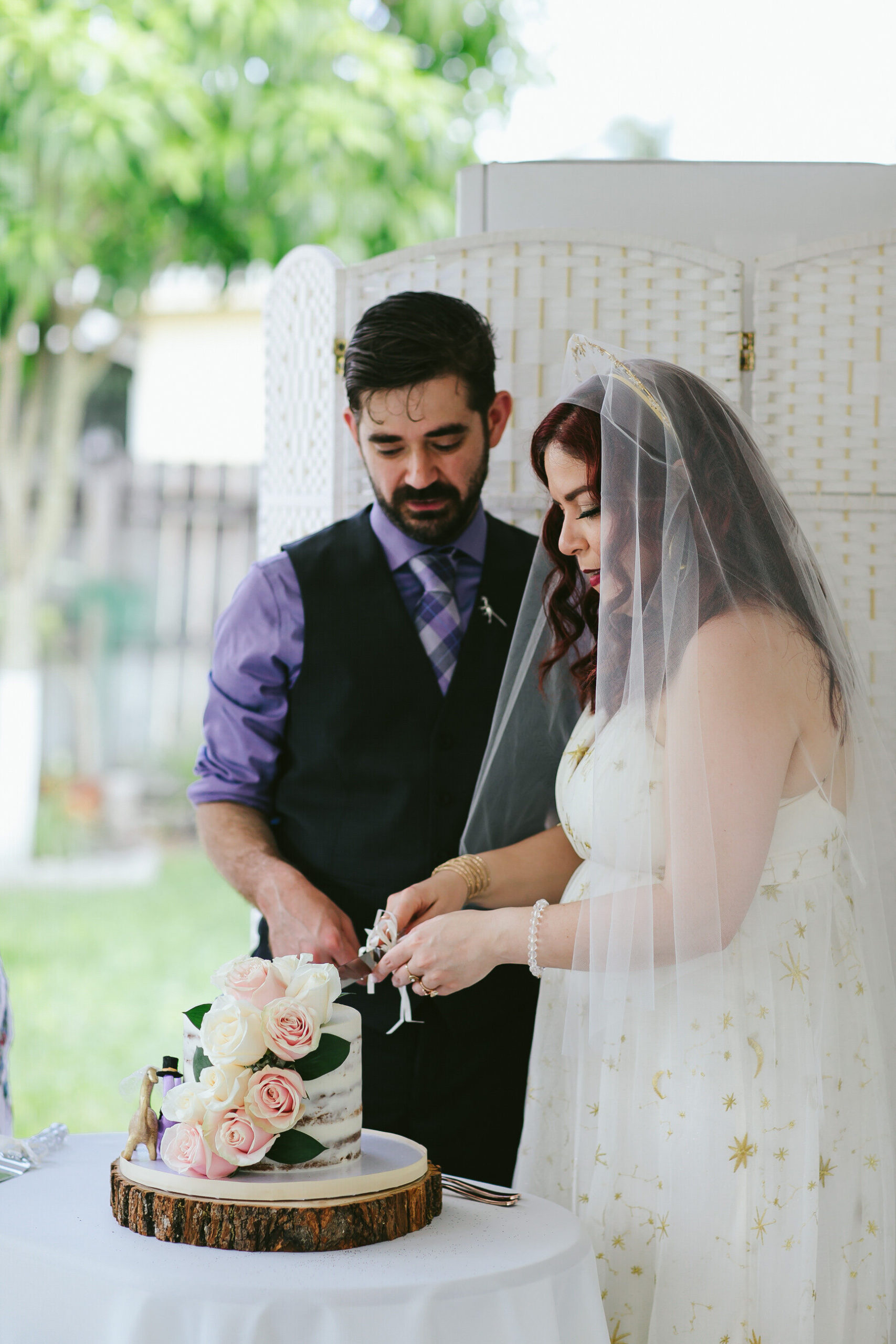 Bride-Groom-Cutting-Vegan-Wedding-Cake-Miami-Backyard-Wedding