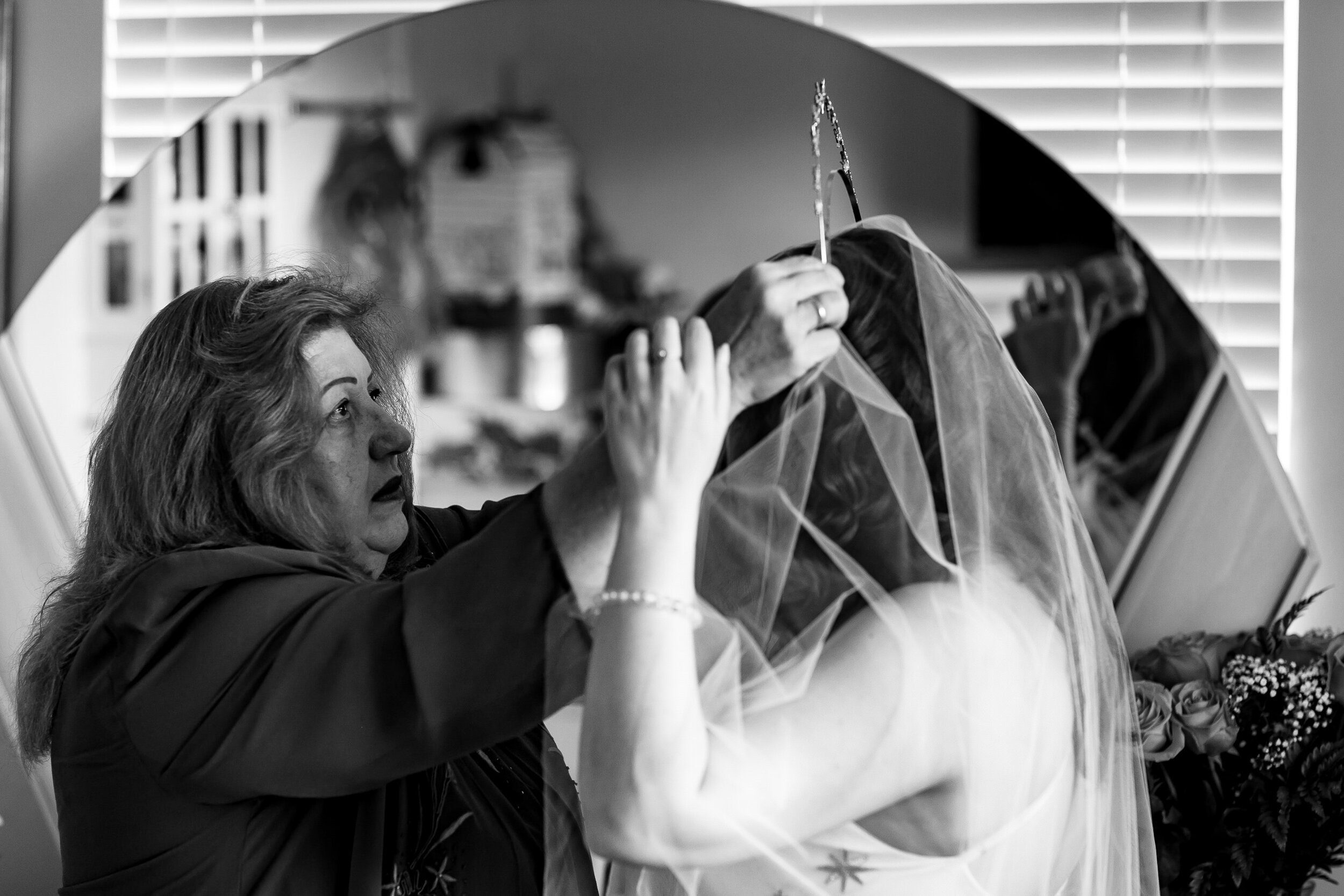 Mother-of-Bride-Placing-Crown-On-Brides-Head-Black-and-White-Getting-Ready-Photo