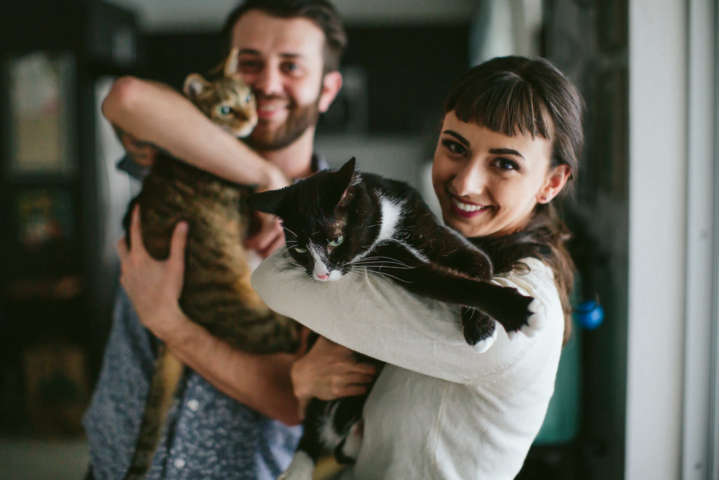 cute-couple-cats-love-engagement-session-tiny-house-photo.jpg