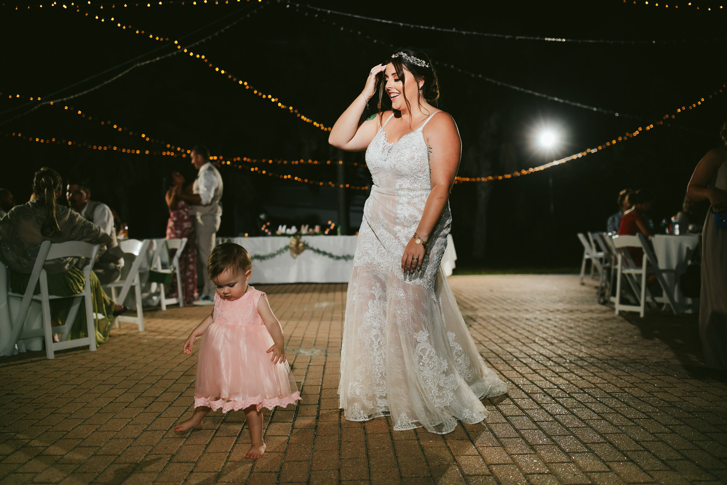 Bride-Dancing-With-Baby-Niece-Florida-Beach-Wedding
