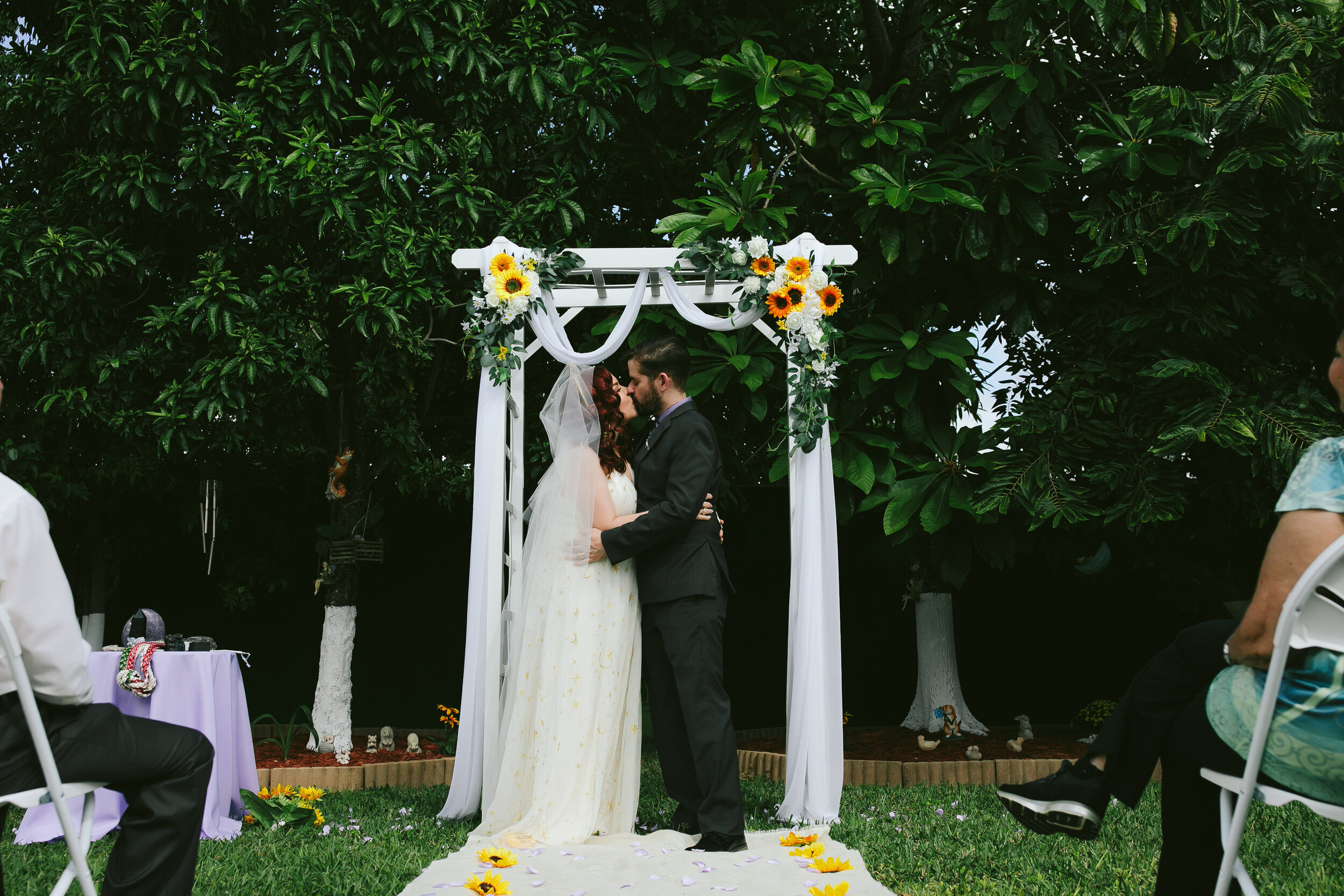 Bride-Groom-First-Kiss-Backyard-Wedding