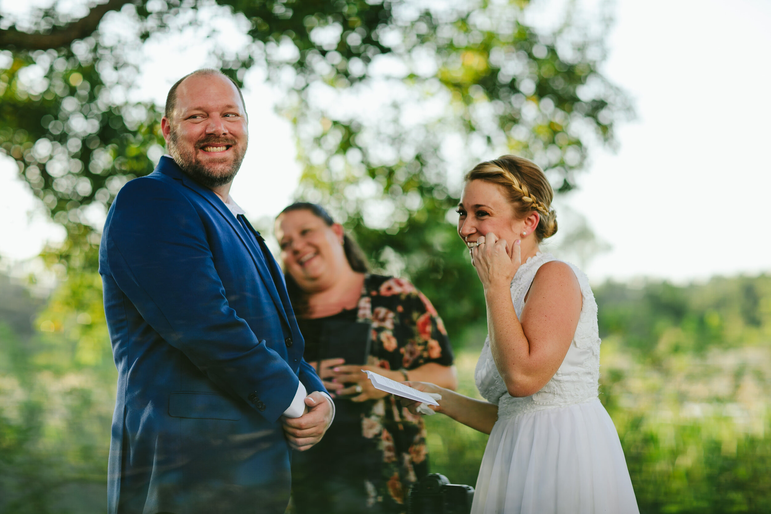 Bride and Groom Laughing During Ceremony Central Florida Wedding