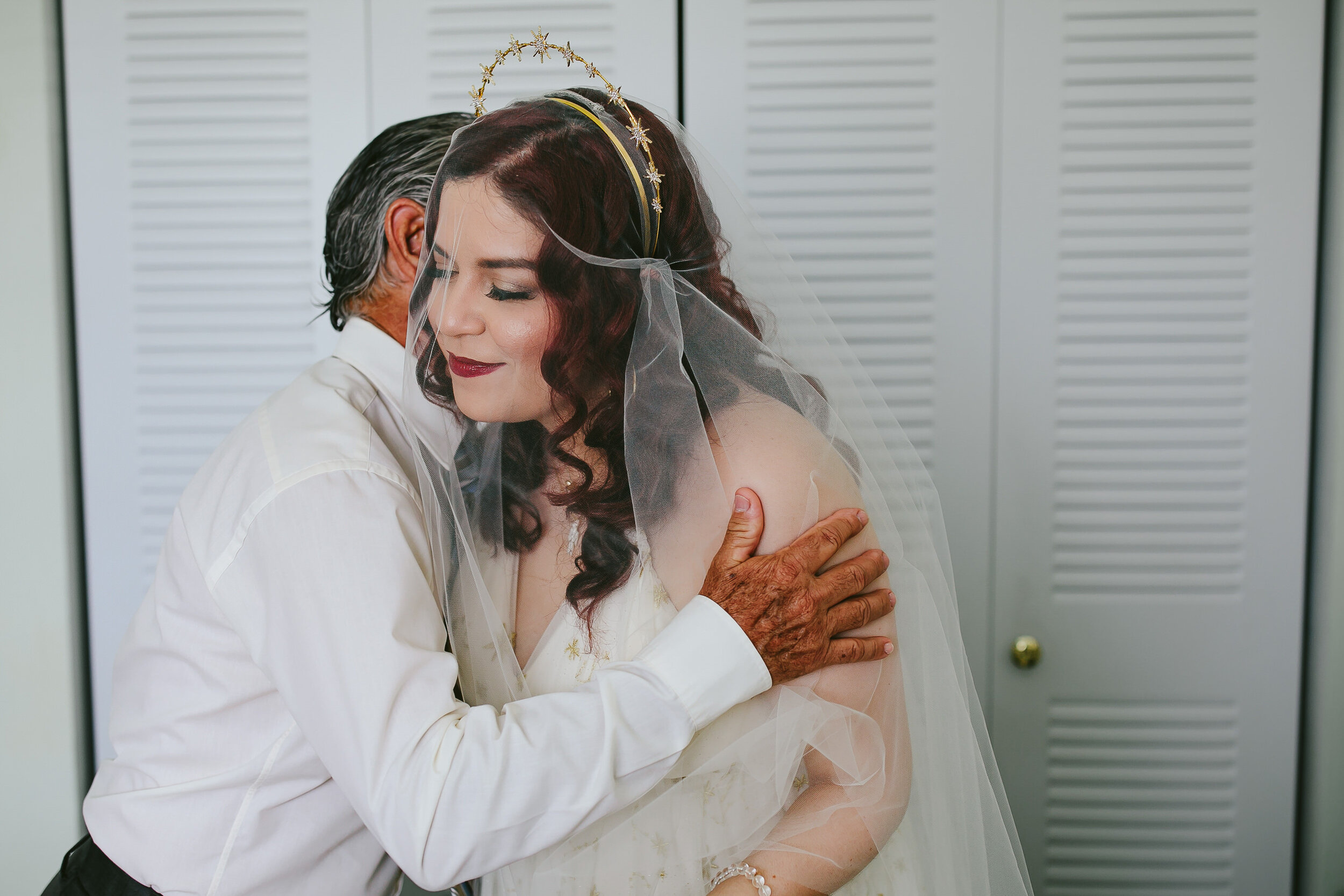 Dad-Embracing-Bride-Just-Before-Wedding-Homestead-Backyard-Ceremony