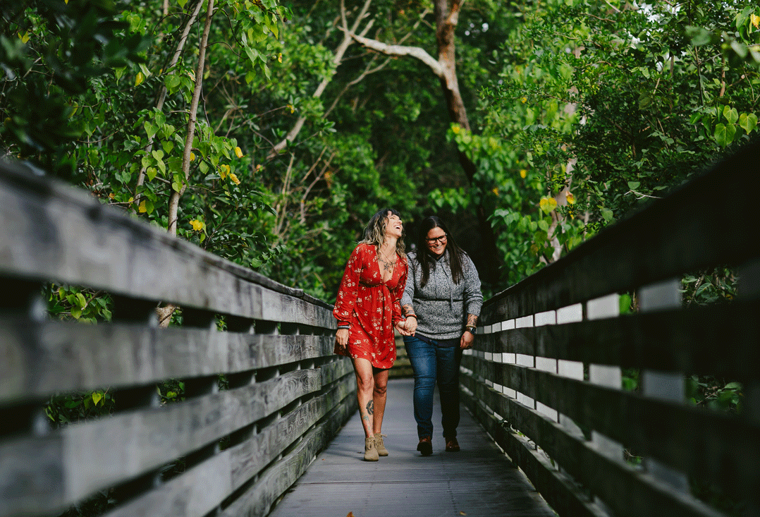 wilton-manors-engagement-session-walking-nature.gif