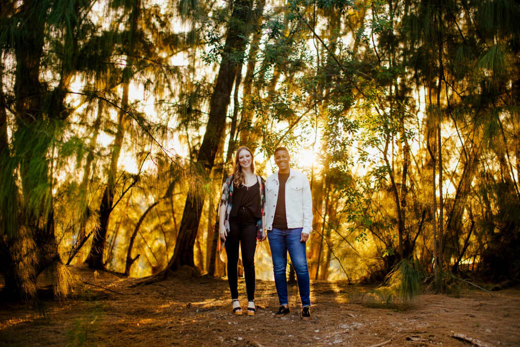 Cute LGBTQ Engagement Portraits in Nature during golden hour
