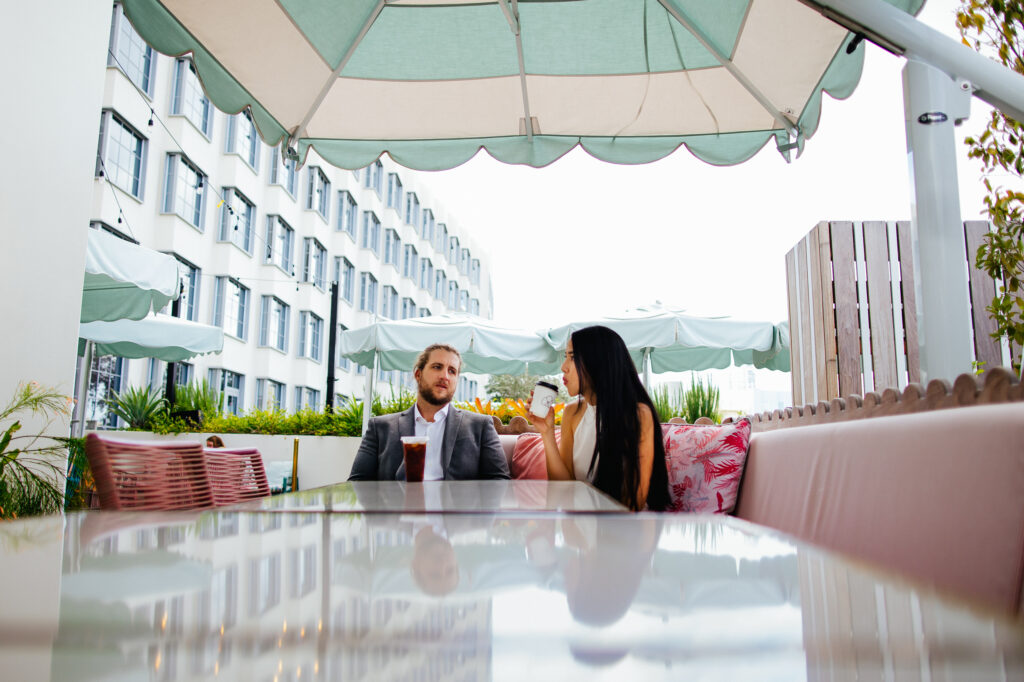 Bride and Groom enjoying coffee on their 420 Elopement at Goodtime Hotel in South Beach, Florida.