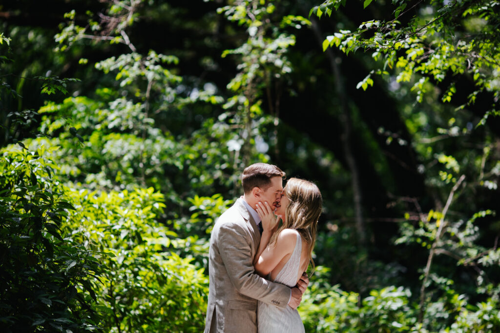 Bride and Groom kissing after the First Look at their Sentimental Garden Wedding