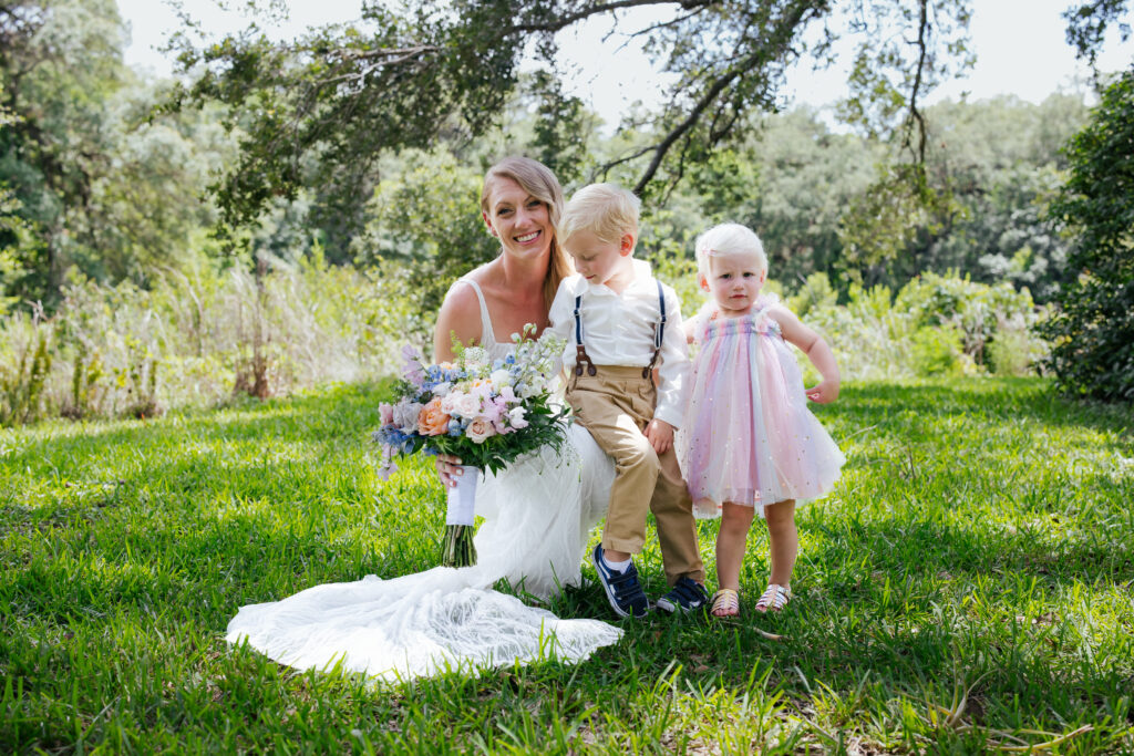 Bride with niece and nephew flower girl and ring bearer.