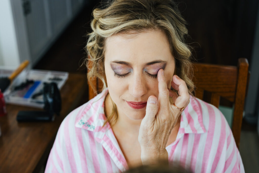 Bride having her Wedding makeup done on the morning of her Destination Wedding in Alabama. 