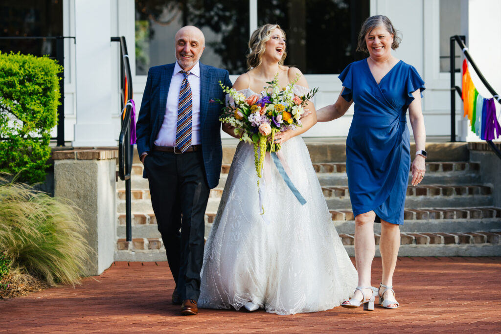 Bride with Parents walking down the aisle at her Destination Wedding in Alabama