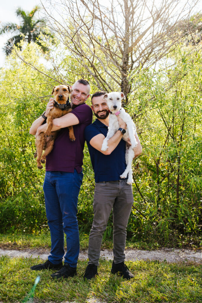 LGBTQ+ Couple with their two dogs at Wilton Manors Park