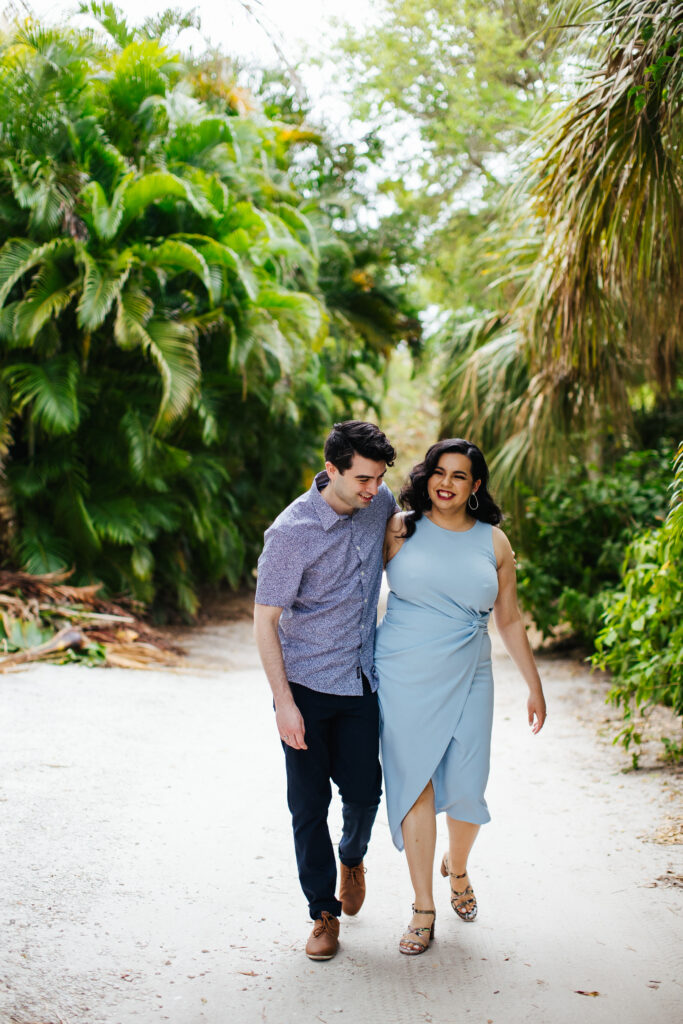 Quirky Couple posing for Engagement Portraits in Vero Beach by Tiny House Photo