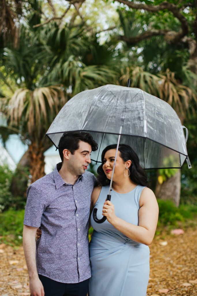 Quirky Couple posing for Engagement Portraits in Vero Beach by Tiny House Photo