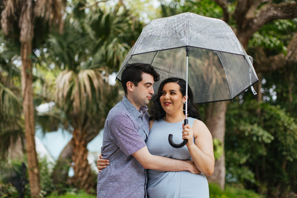 Quirky Couple posing for Engagement Portraits in Vero Beach by Tiny House Photo