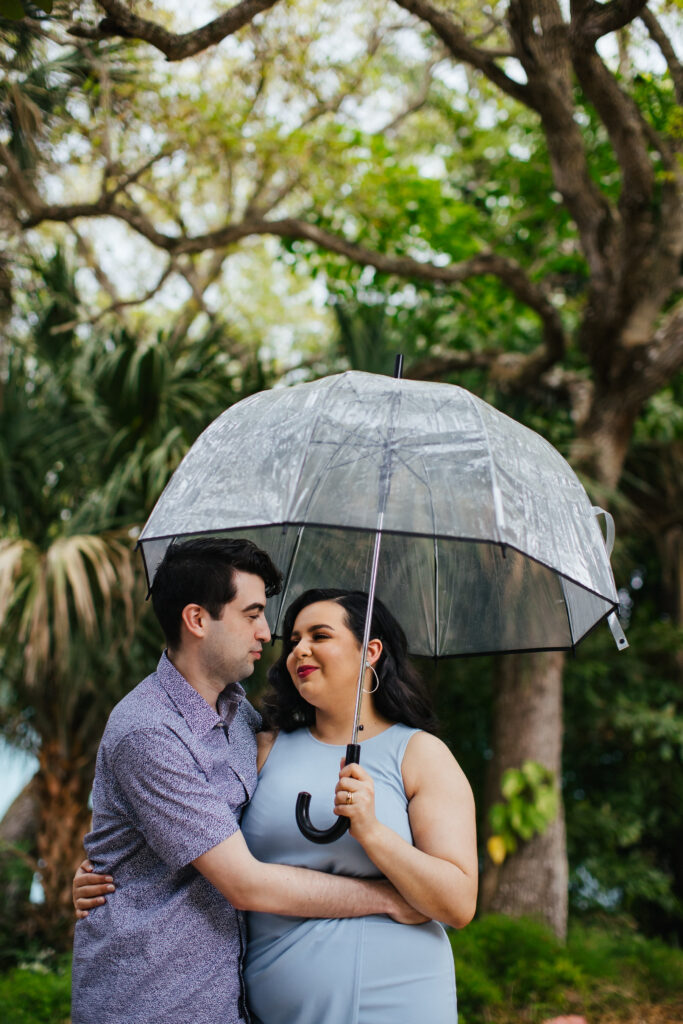 Quirky Couple posing for Engagement Portraits in Vero Beach by Tiny House Photo