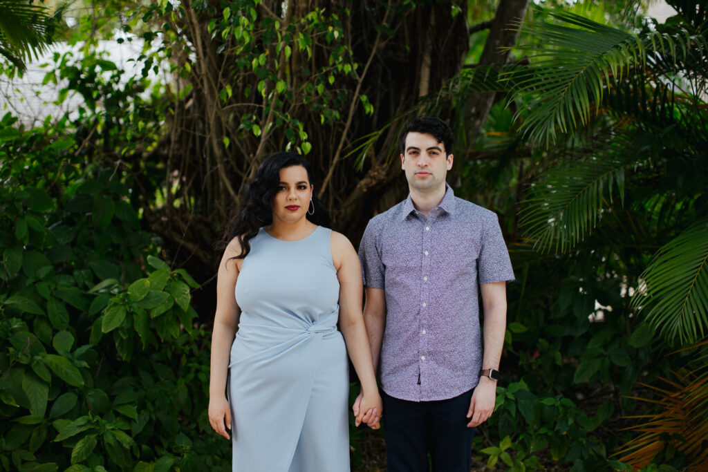 Quirky Couple posing for Engagement Portraits in Vero Beach by Tiny House Photo