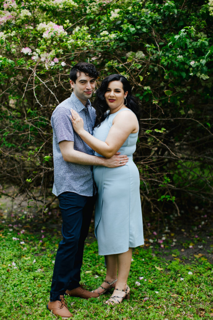 Quirky Couple posing for Engagement Portraits in Vero Beach by Tiny House Photo