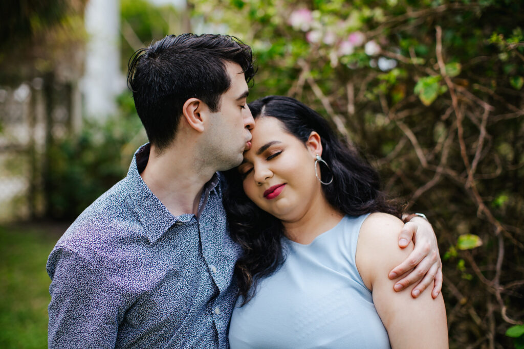 Quirky Couple posing for Engagement Portraits in Vero Beach by Tiny House Photo