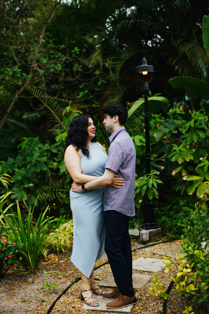 Quirky Couple posing for Engagement Portraits in Vero Beach by Tiny House Photo