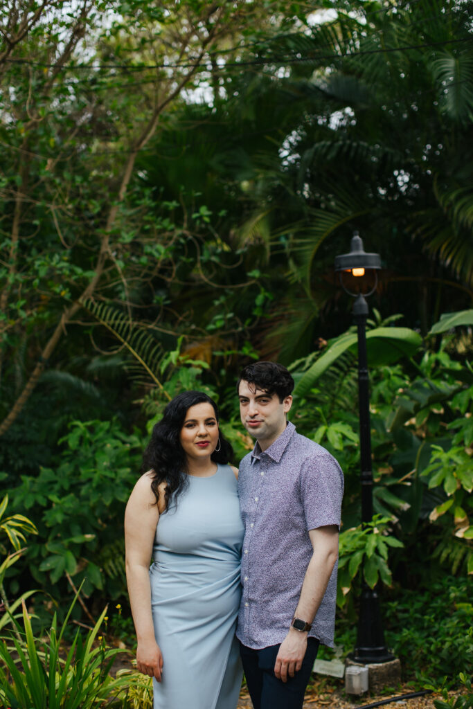 Quirky Couple posing for Engagement Portraits in Vero Beach by Tiny House Photo