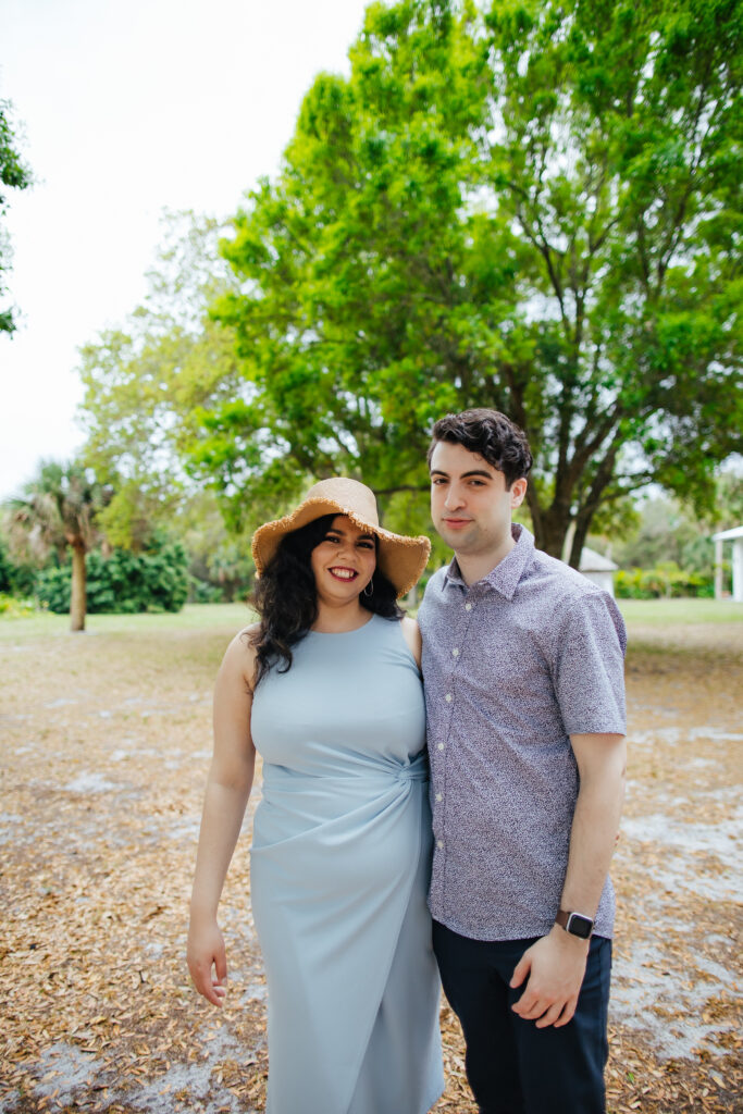 Quirky Couple posing for Engagement Portraits in Vero Beach by Tiny House Photo