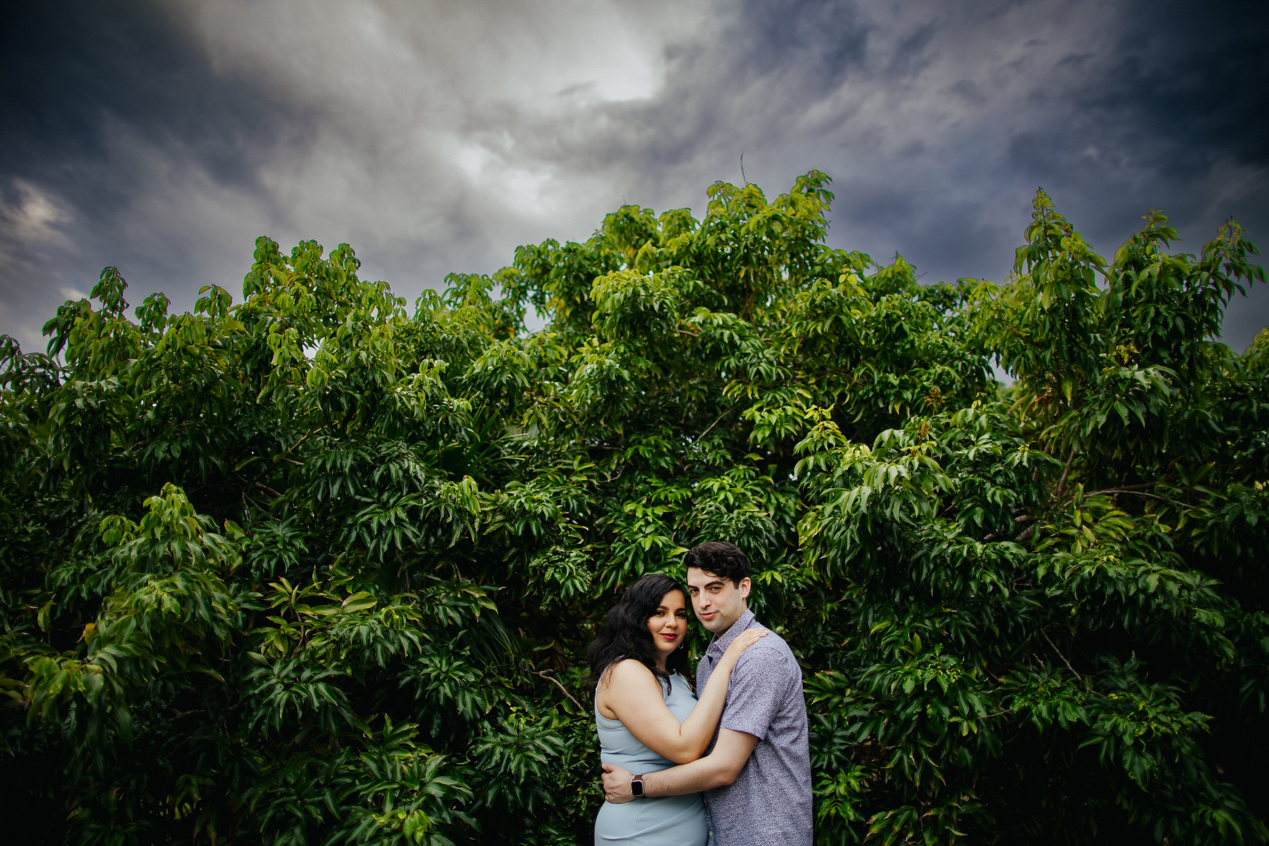 Quirky Couple posing for Engagement Portraits in Vero Beach by Tiny House Photo