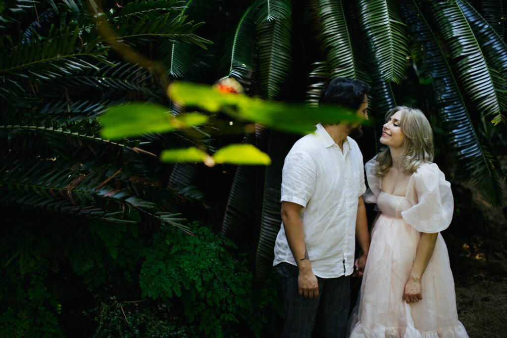 Couple posing for their Engagement Photos at Fairchild Botanical Garden in Florida