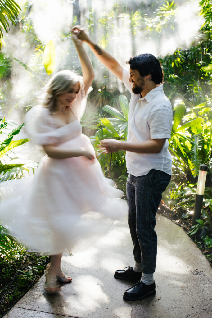 Couple Dancing during their Engagement Photos at Fairchild Botanical Garden in Florida