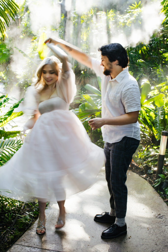 Couple Dancing during their Engagement Photos at Fairchild Botanical Garden in Florida