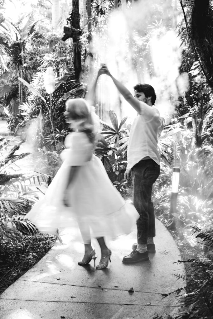 Couple Dancing during their Engagement Photos at Fairchild Botanical Garden in Florida