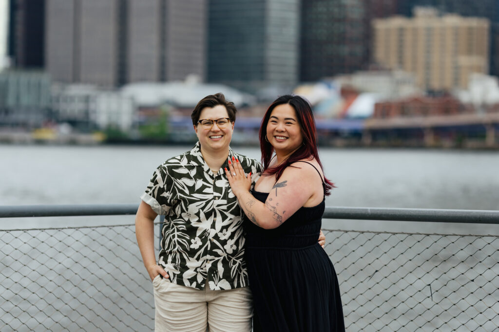 Engagement Portraits on the waterfront in Dumbo Brooklyn beside the Brooklyn Bridge